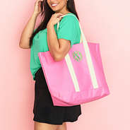 hot pink waterproof tote on shoulder