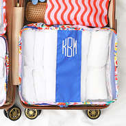 wildflower grove packing bag in suitcase