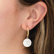cable hoop earrings in ear