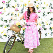pink flutter sleeve top on peyton with bike