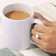 pearl silver adjustable ring on coffee