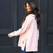 light pink sequin sports sweatshirt on peyton - side view