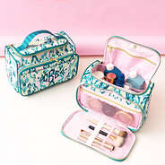 bermuda ikat carry all toiletry case studio shot - pink background