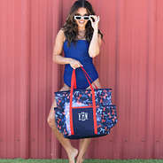 girl carrying personalized mesh tote in americana bows