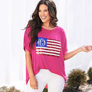 girl wearing monogrammed sequin flag t shirt in hot pink