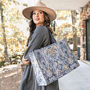 girl with gray ikat monogrammed basic tote bag over shoulder