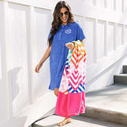 girl wearing monogrammed terry cover up dress with beach towel