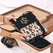 folded monogrammed clear beach tote in classic cheetah in luggage