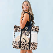 girl with classic cheetah monogrammed clear beach tote over shoulder close up