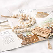 wood beaded monogrammed garland with magazines
