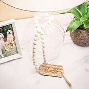 name on personalized wooden tag around lamp