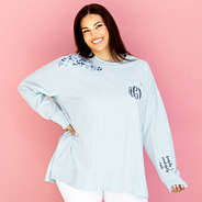 personalized ice blue faith sweatshirt in front of pink paper
