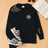 monogrammed blessed black shirt with leopard sneakers