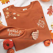 embroidery detail of pumpkin fall leaves and thankful and blessed sweatshirt