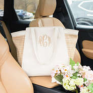 bone tropical travel tote in car