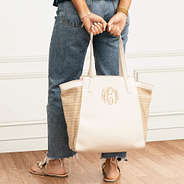 bone tropical travel tote in hands