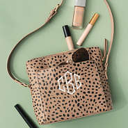 classic crossbody in leopard with accessories