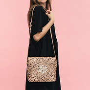 personalized classic crossbody in leopard over shoulder