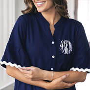 close up monogrammed navy ric rac dress