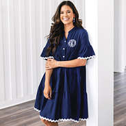girl wearing navy ric rac monogrammed dress