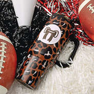 cheetah travel tumbler with football bow sticker