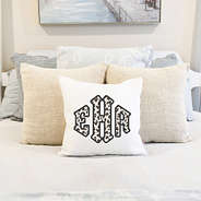 personalized pillow on bed with leopard design