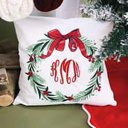 holiday wreath pillow with red monogram