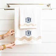 bath towel set hanging with navy fishtail monogram