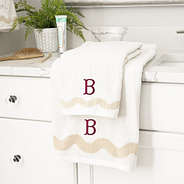 bath towel set with burgundy fishtail initial monogram