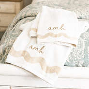 bath towel set on bed