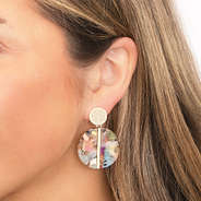 multi resin earrings in ear
