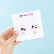 silver patriotic earring set in hand