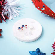 silver patriotic earring set on marble dish