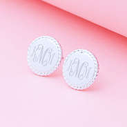 close up monogrammed nala earrings