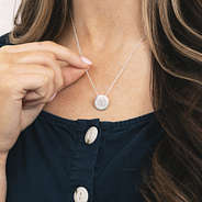 girl wearing nala monogrammed necklace