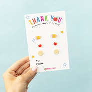 gold teacher earring set with blue background