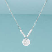 silver pearl monogrammed necklace on blue background