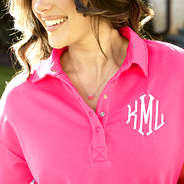 heart necklace on neck with pink puff sleeve sweatshirt
