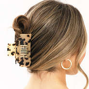 tortoise hair clip with hair pulled up