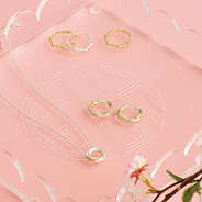 pave cable hoop earrings with cable necklace and ring stack