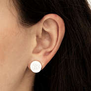 monogrammed year round earring disc in ear