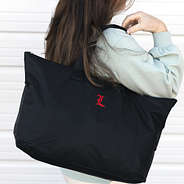 Louisville Cardinals Packable Duffel Bag on Shoulder