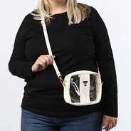 texas tech clear crossbody in bone on girl wearing black long sleeve shirt