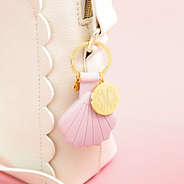 pink airtag key chain on bag
