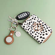 brown airtag key chain with keychain wallet