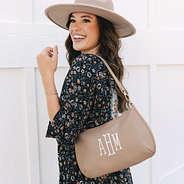 girl with personalized shoulder bag in taupe over shoulder