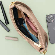 inside of taupe monogrammed shoulder bag