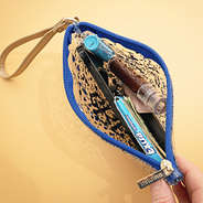 inside of glitter blue wristlet pouch
