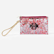 monogrammed glitter wristlet pouch in crimson with black octagonal monogram