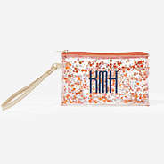 monogrammed glitter wristlet pouch in orange navy monogram